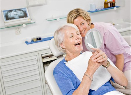 dentistry - Dental assistant working on patient Stock Photo - Premium Royalty-Free, Code: 649-02665306