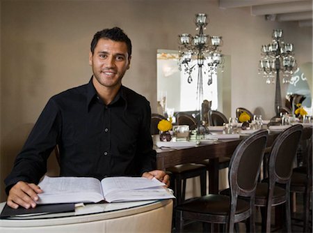 podium not business - Portrait of a male host to a restaurant Stock Photo - Premium Royalty-Free, Code: 649-02665437