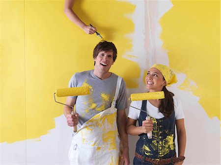 Couple messing around with paint. Stock Photo - Premium Royalty-Free, Code: 649-02665672