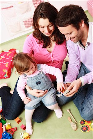 Family playing together Stock Photo - Premium Royalty-Free, Code: 649-02731318