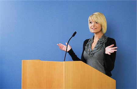 public speaker (female) - Woman talking from lectern Stock Photo - Premium Royalty-Free, Code: 649-02731560