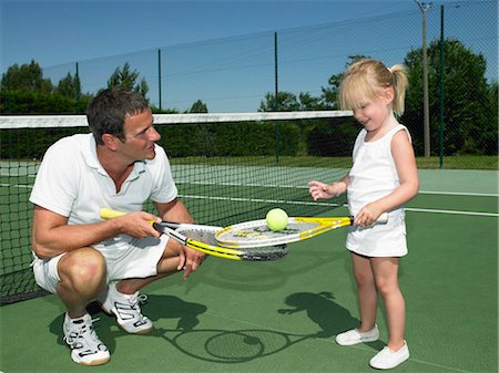 Tennis lesson for young child Foto de stock - Sin royalties Premium, Código: 649-02731768