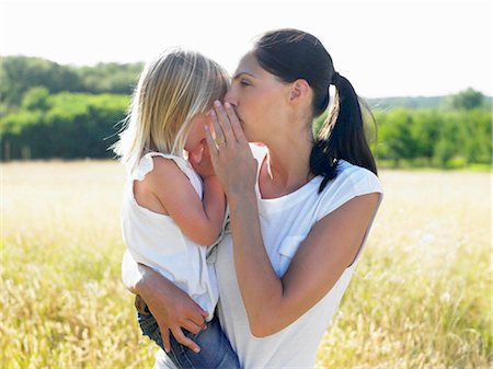 Mother and daughter in a field Stock Photo - Premium Royalty-Free, Code: 649-02731776