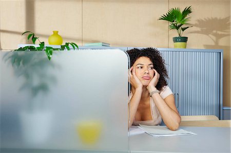 man bored in cubicle