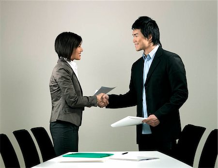 Business colleagues shaking hands Stock Photo - Premium Royalty-Free, Code: 649-02732478