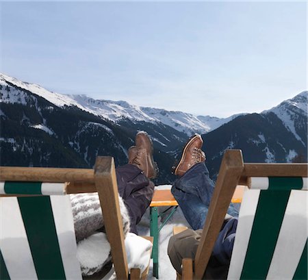 Two women relaxing on chairs on mountain Stock Photo - Premium Royalty-Free, Code: 649-02732646