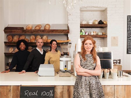 front of a bakery store - Business owner posing with employees Stock Photo - Premium Royalty-Free, Code: 649-02732714