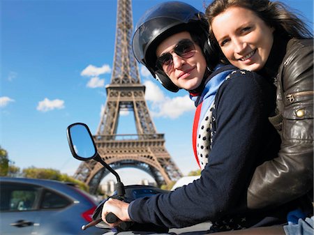 pictures of people riding scooters - Couple on moped in Paris Stock Photo - Premium Royalty-Free, Code: 649-02732894