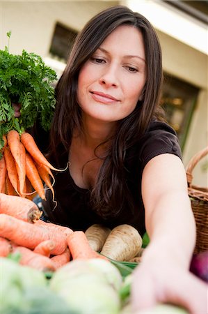 farmers market female - Woman shopping fresh vegetables Stock Photo - Premium Royalty-Free, Code: 649-03008533