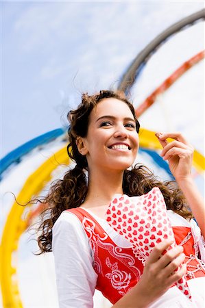 Young Woman Eating Almonds Stock Photo - Premium Royalty-Free, Code: 649-03008652