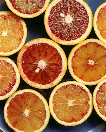 Food - Blood oranges cut in half Foto de stock - Sin royalties Premium, Código: 649-03008814