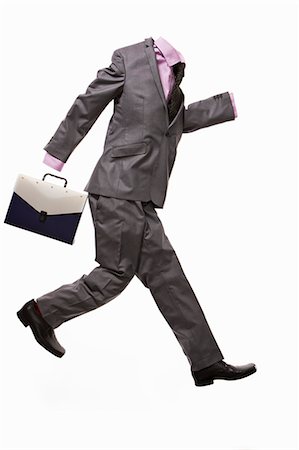 disappearing - A male suit with briefcase,running Stock Photo - Premium Royalty-Free, Code: 649-03009224