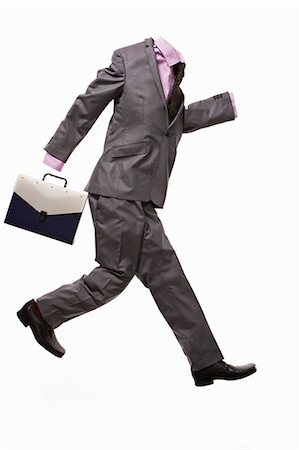 suit not people - A male suit with briefcase,running Stock Photo - Premium Royalty-Free, Code: 649-03009224