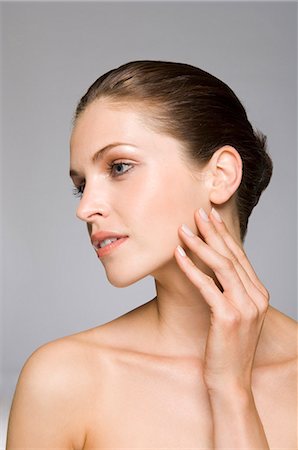 Female beauty model touching skin Foto de stock - Sin royalties Premium, Código: 649-03009267