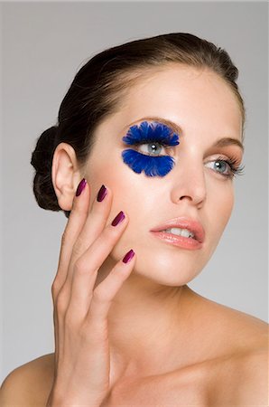 pluma - female beauty with large fake eyelashes Foto de stock - Sin royalties Premium, Código: 649-03009306