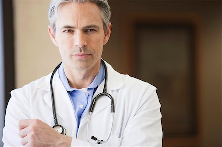 doctor close serious - Male Doctor smiling Stock Photo - Premium Royalty-Free, Code: 649-03009548