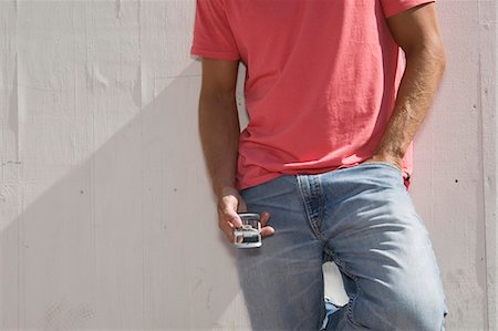 simsearch:673-02138722,k - Young man with cell phone Stock Photo - Premium Royalty-Free, Code: 649-03009566