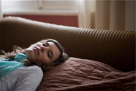 girl lying on bed asleep Stock Photo - Premium Royalty-Free, Code: 649-03009805