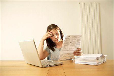 pressure of study - woman and bills Stock Photo - Premium Royalty-Free, Code: 649-03009862