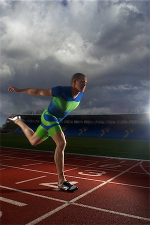 runner finish line - athlete crossing line Stock Photo - Premium Royalty-Free, Code: 649-03009880