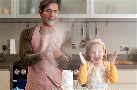 family mess - father and daughter cooking Stock Photo - Premium Royalty-Free, Code: 649-03010148