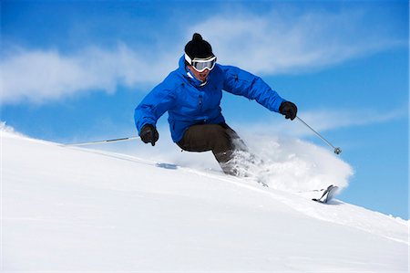 descending - Man in blue & black outfit turning. Stock Photo - Premium Royalty-Free, Code: 649-03077596