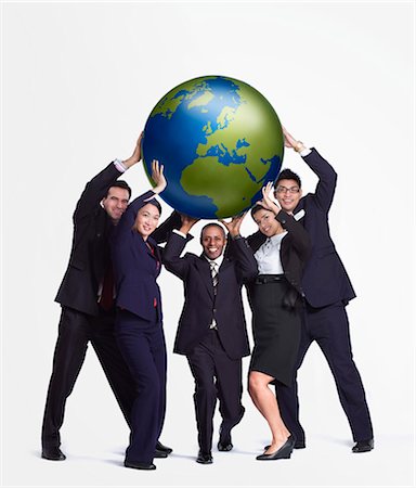 A business group holding up a big globe Stock Photo - Premium Royalty-Free, Code: 649-03077993