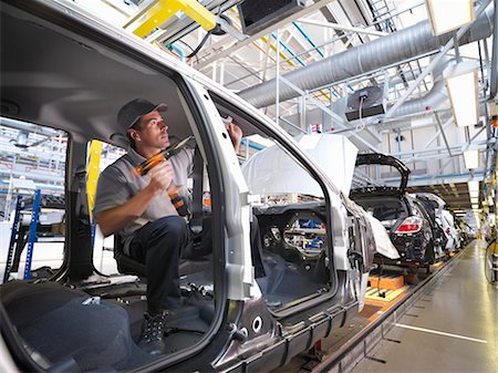 drill - Car Plant Worker On Production Line Stock Photo - Premium Royalty-Free, Code: 649-03154492