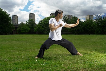 man doing martial arts Stock Photo - Premium Royalty-Free, Code: 649-03294381