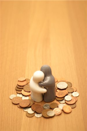 small figures on money Stock Photo - Premium Royalty-Free, Code: 649-03294405