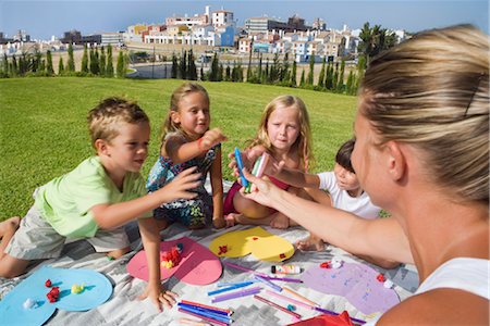 simsearch:693-06379441,k - Teacher teaching students arts & crafts Stock Photo - Premium Royalty-Free, Code: 649-03294717