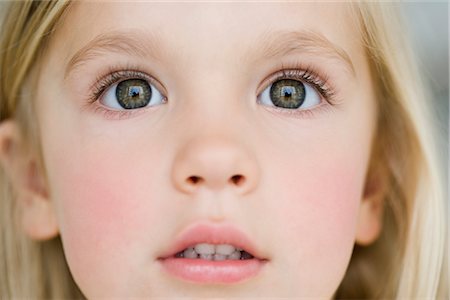fascinated - young girl looking dazzled Stock Photo - Premium Royalty-Free, Code: 649-03295980