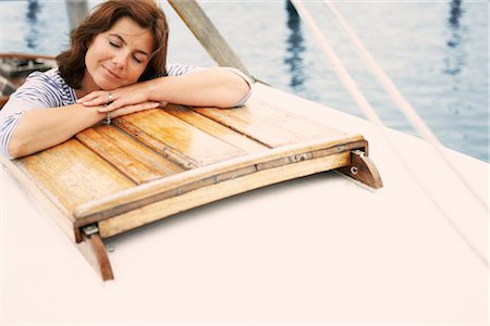 simsearch:649-03292846,k - Middle aged woman on old boat Stock Photo - Premium Royalty-Free, Code: 649-03296483