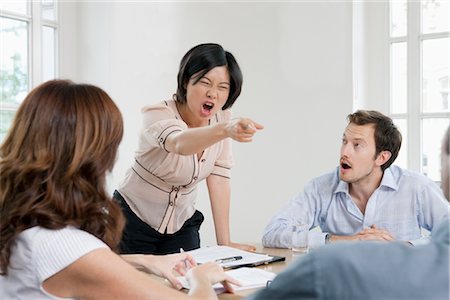 angry conference room meeting