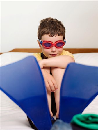 A boy wearing goggles and flippers Stock Photo - Premium Royalty-Free, Code: 649-03297385