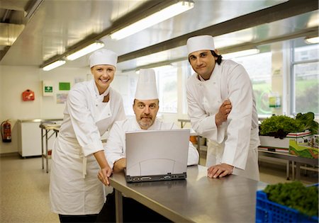 simsearch:649-03447474,k - Three chefs looking at the camera Fotografie stock - Premium Royalty-Free, Codice: 649-03297495