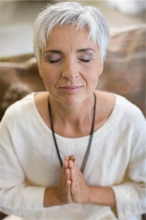 meditating woman Stock Photo - Premium Royalty-Free, Code: 649-03291720