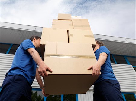 pictures of people moving house - two men carrying boxes Stock Photo - Premium Royalty-Free, Code: 649-03292107