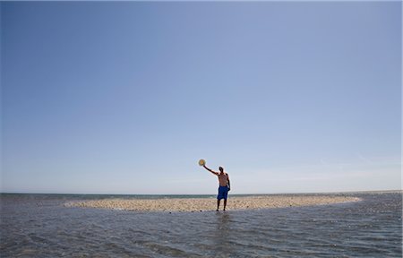 portsmouth - Man standing on small island Foto de stock - Sin royalties Premium, Código: 649-03292821