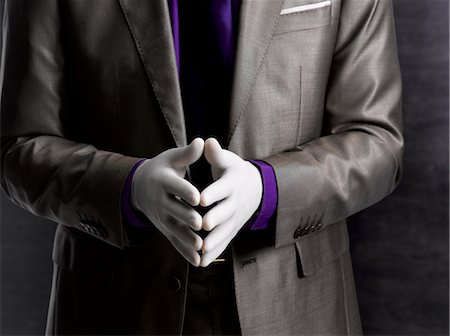 simsearch:649-05658209,k - Business man wearing rubber gloves Stock Photo - Premium Royalty-Free, Code: 649-03293569