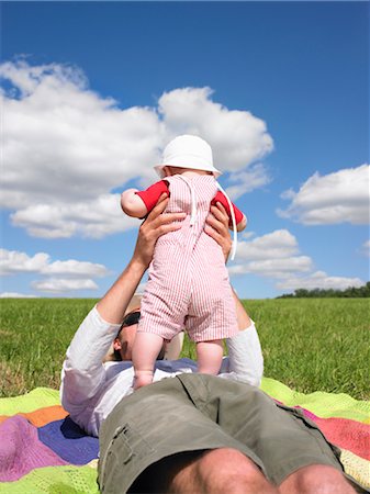 dad not mom child back - father and baby in field Stock Photo - Premium Royalty-Free, Code: 649-03293656