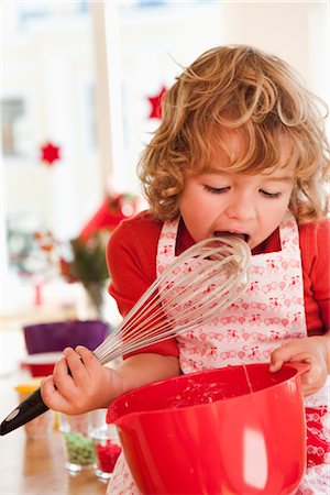 eggs whisk bowl - Young boy licking dough from beater Stock Photo - Premium Royalty-Free, Code: 649-03362623