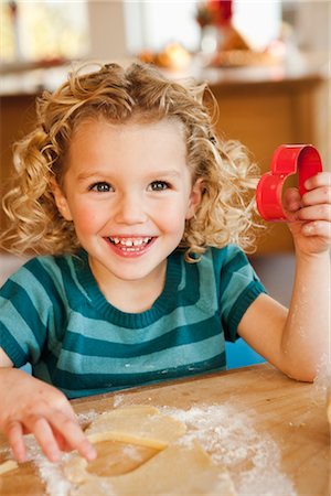 simsearch:649-06432926,k - young girl cutting cookies Stock Photo - Premium Royalty-Free, Code: 649-03362647