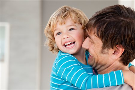 simsearch:649-06432444,k - son and father hugging Stock Photo - Premium Royalty-Free, Code: 649-03362721