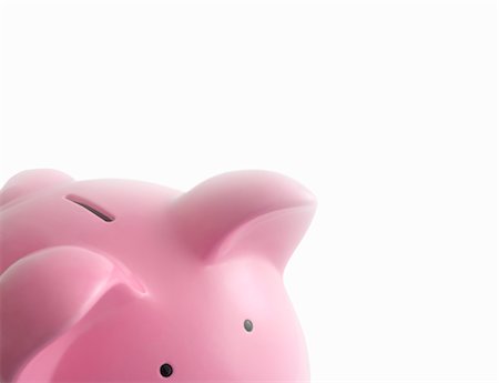 save concept - Piggy bank against white Stock Photo - Premium Royalty-Free, Code: 649-03362874