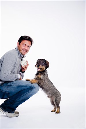 Man and his dog Foto de stock - Sin royalties Premium, Código: 649-03363172