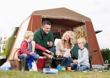 Family cooking together outdoors Stock Photo - Premium Royalty-Free, Code: 649-03417595