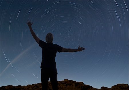 sky at night - man watching the starry night sky Stock Photo - Premium Royalty-Free, Code: 649-03417679