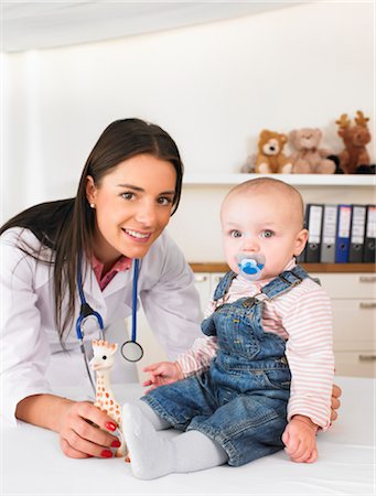 doctor full body portrait - Doctor and baby Stock Photo - Premium Royalty-Free, Code: 649-03418228