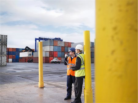 export - Port Workers With Laptop And Containers Stock Photo - Premium Royalty-Free, Code: 649-03418311